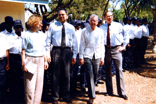 Former First Lady Rosalynn Carter joined former Chairman of the Joint Chiefs of Staff Colin Powell, former U.S. President Jimmy Carter, and then-U.S. Senator Sam Nunn (D-Ga.) on a trip to Haiti.
