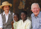 Jimmy Carter visits children suffering from schistosomiasis.