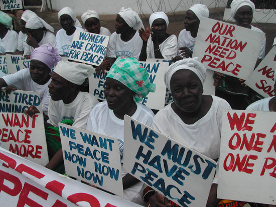 Liberian women demonstrate at the American Embassy.