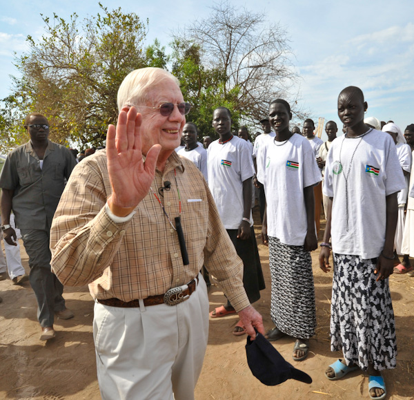 Former U.S. President Jimmy Carter arrives in Molujore village, Southern Sudan.