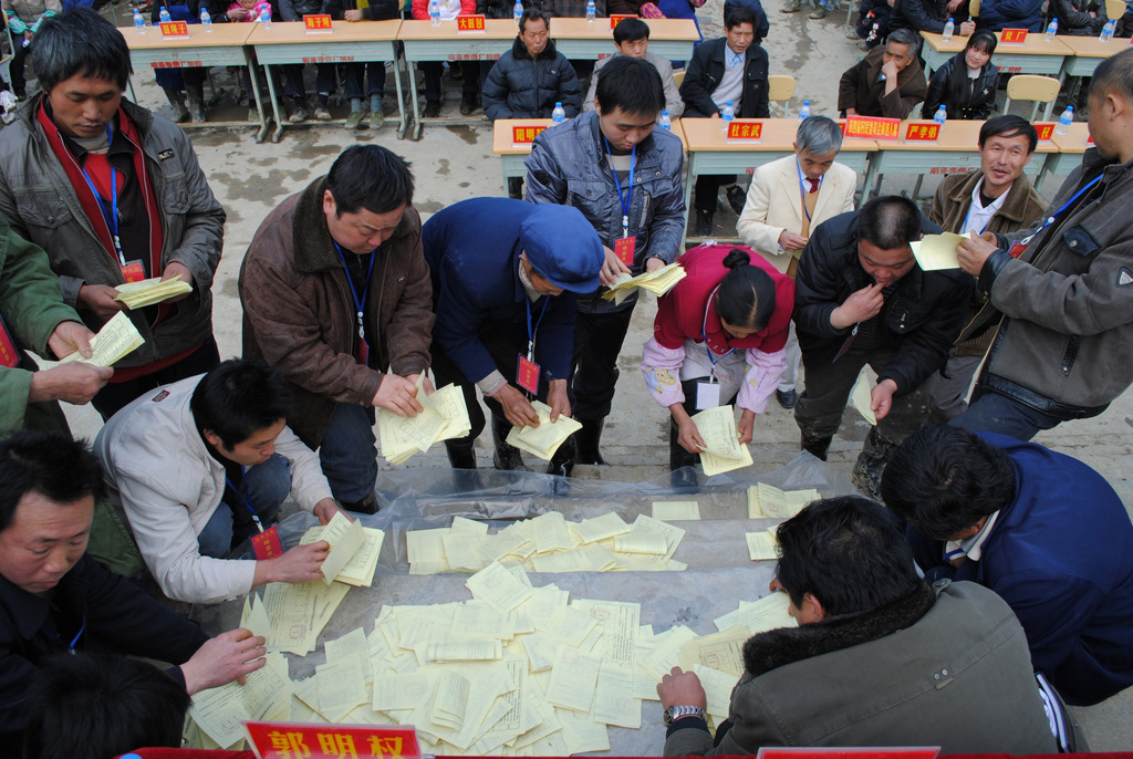 Officials tally the ballots cast in Zhongping Village on March 10.
