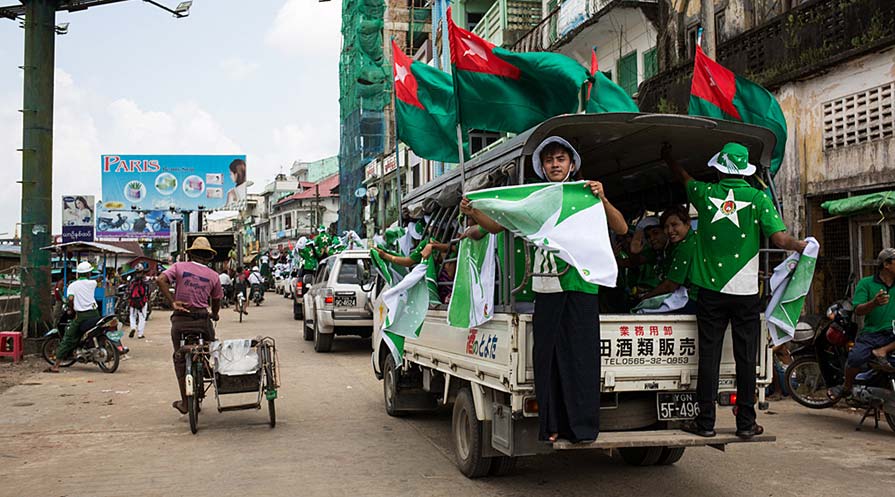 Photo of a Union Solidarity and Development Party (USDP) convoy driving through Pathein City.