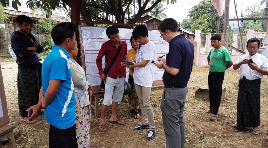 Photo of person conducting a field-based assessment in Myanmar.