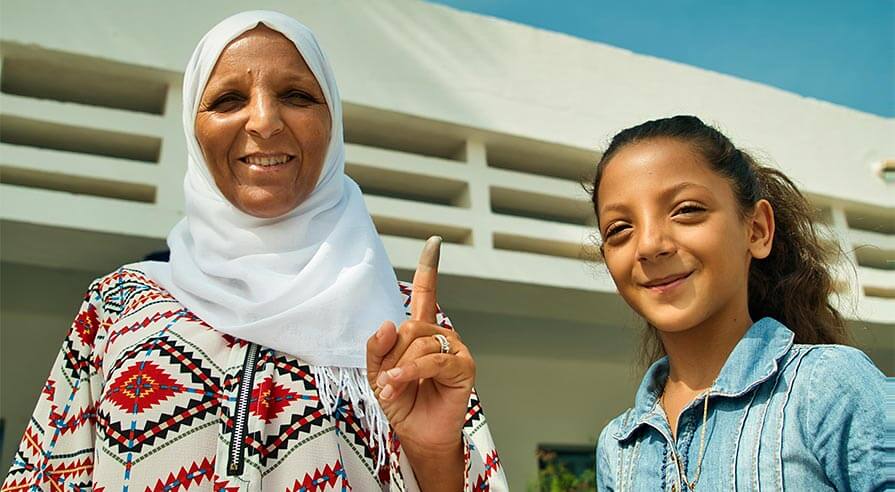 As in many countries, voters must dip their fingers in indelible ink, which prevents people from voting twice.