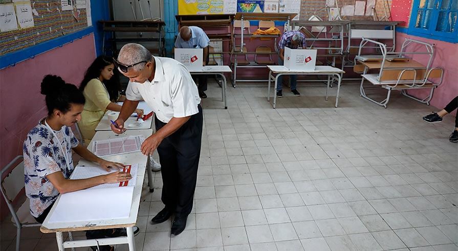 Between the presidential election and runoff, citizens voted for members of parliament.