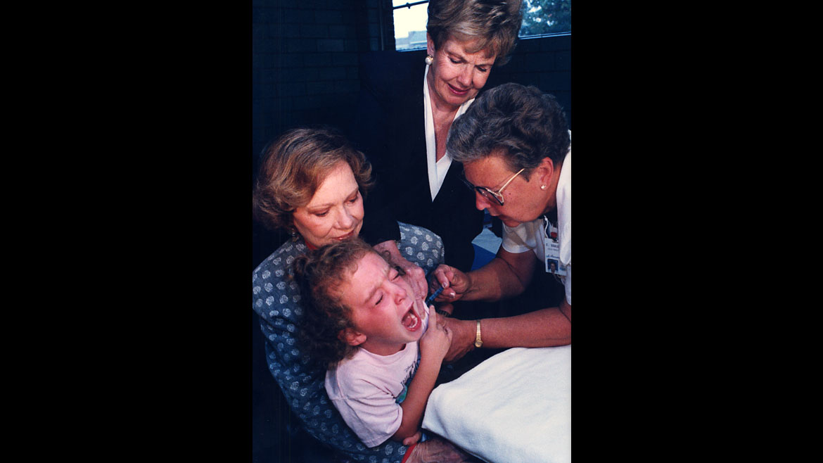 Dedicated to issues affecting women and children, Rosalynn Carter co-founded Every Child By Two after leaving the White House and traveled nationwide to see that every child received immunizations by age two. This photo was taken in Philadelphia, Pennsylvania, 1993. (Photo: The Carter Center)