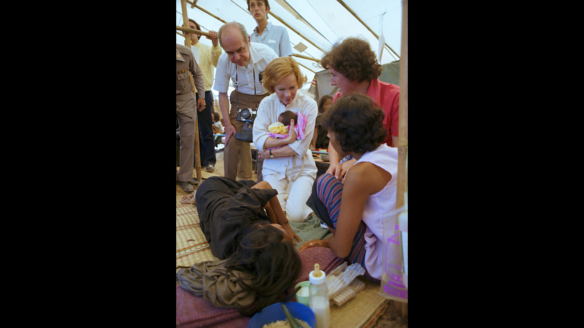 Rosalynn Carter raised tens of millions of dollars to ease the plight of refugees. Here she holds a child at a Cambodian refugee camp in Thailand on November 9, 1979. (Photo: Jimmy Carter Library)