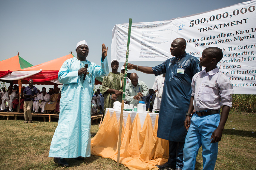  Dr. Emmanuel Miri (left), Carter Center country representative in Nigeria, presides over a celebration commemorating the distribution of 500 million doses of medication to combat neglected tropical diseases. The Nov. 4, 2016, ceremony was held in Gidan Gimba, Nasarawa state, because 42 percent of Carter Center treatments have been administered through programs in Nigeria. (Photo: The Carter Center/R.MacDowall)