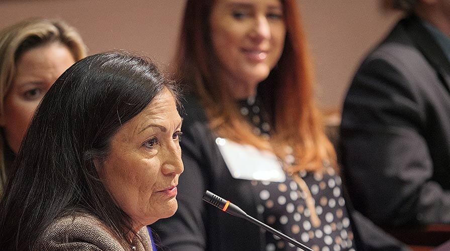 Deb Haaland, one of the first two Native American women elected to the U.S. Congress, addresses a Carter Center conference on impediments to Native American voting.