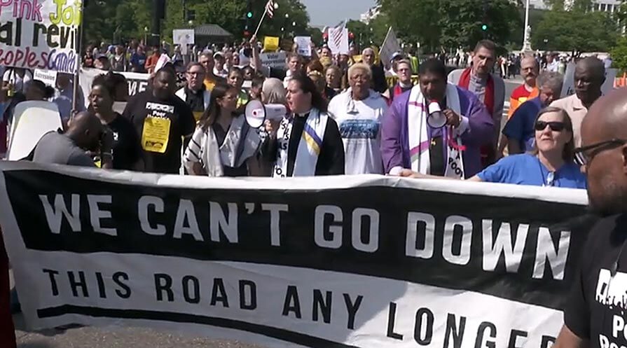 Protestors march in the streets.