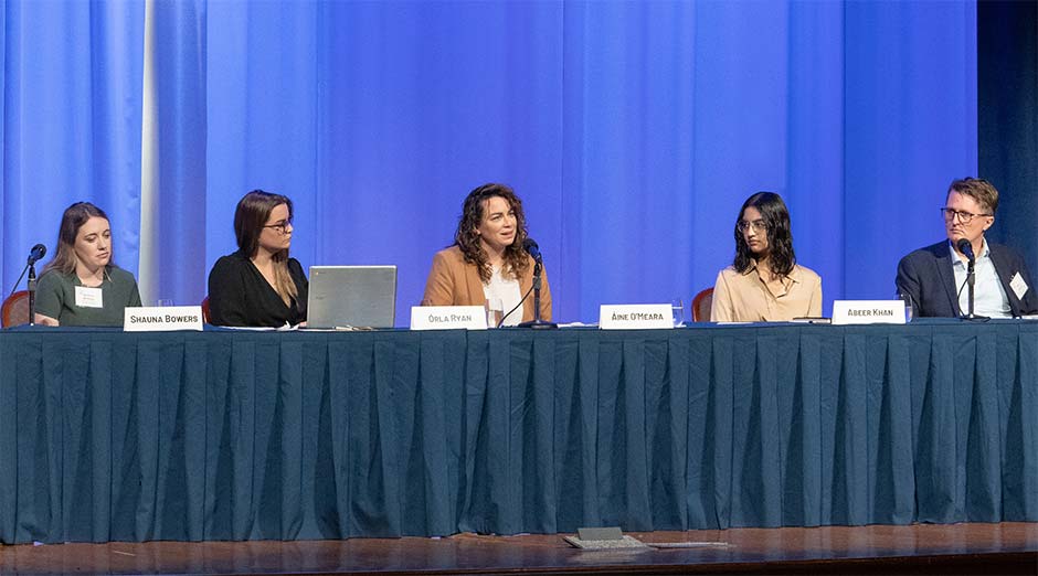 Participants at a panel discussion.