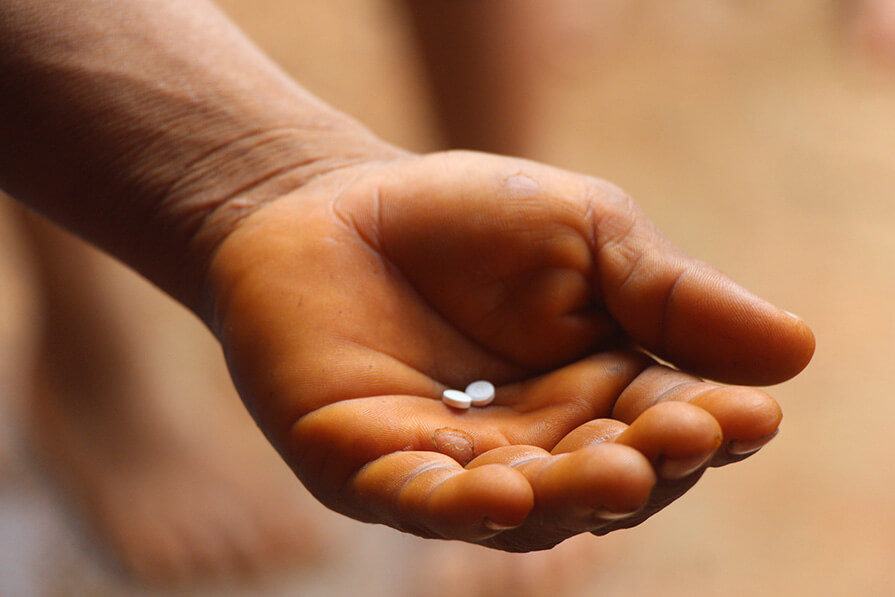 Mectizan pills in a hand