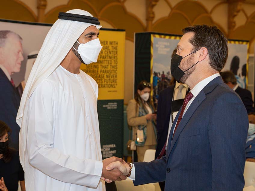 His Excellency Sheikh Shakboot bin Nahyan Al Nahyan and Jason Carter shaking hands.