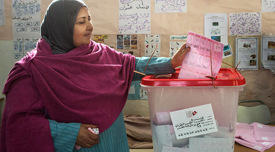 Election Observation:  The Carter Center has monitored 107 elections in 39 countries. Here, a woman in Tunisia votes in the first truly democratic presidential election since its long-term dictator was forced from office during the Arab Spring. The Center continues to work in Tunisia, offering support to the government and civil society in this new democracy. 